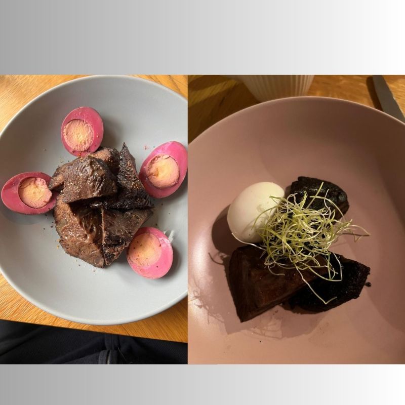 The photo shows two dishes served: the first with meat in the middle and eggs cooked in beetroot water, halved around a meat bun.
The second with meat and a plain boiled egg.